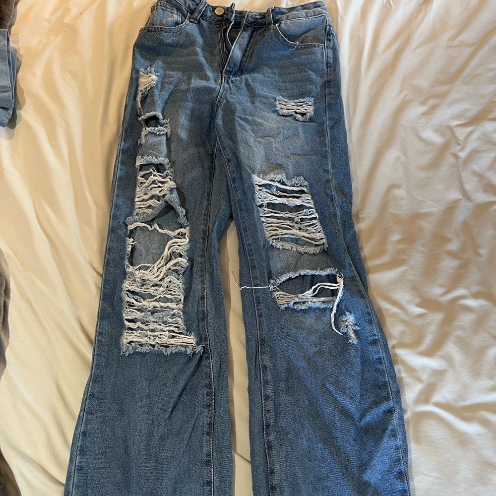 Ripped jeans.